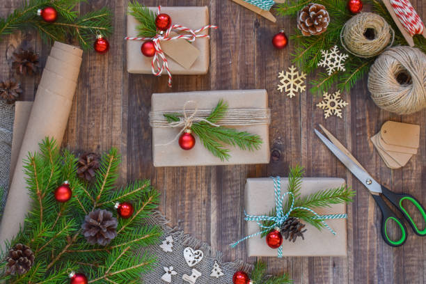 Christmas gifts on table with decorations