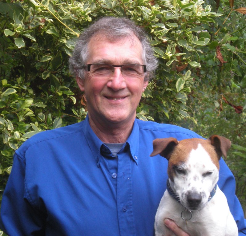 Meet our newest Trustee Peter Gregory. After a decade in conventional medicine Vet starts using homeopathy. Vet holding a brown and white dog